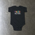 All The Small Things Colorful onesie in black, laid flat