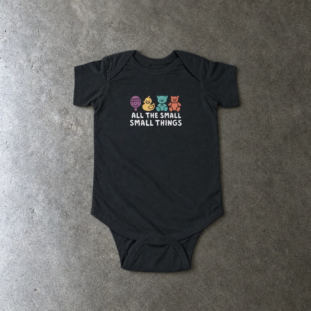 All The Small Things Colorful onesie in black, laid flat