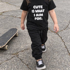 Toddler wearing the Cute Is What I Aim For toddler tee
