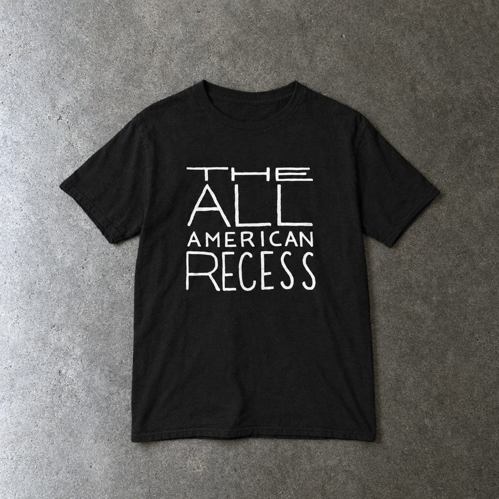 All American Recess youth tee in black, laid flat