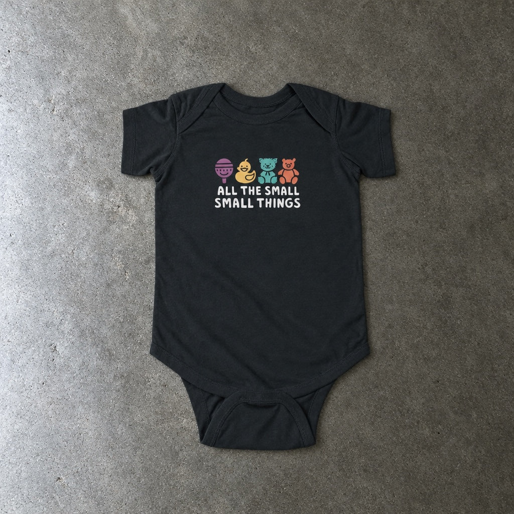 All The Small Things Colorful onesie in black, laid flat