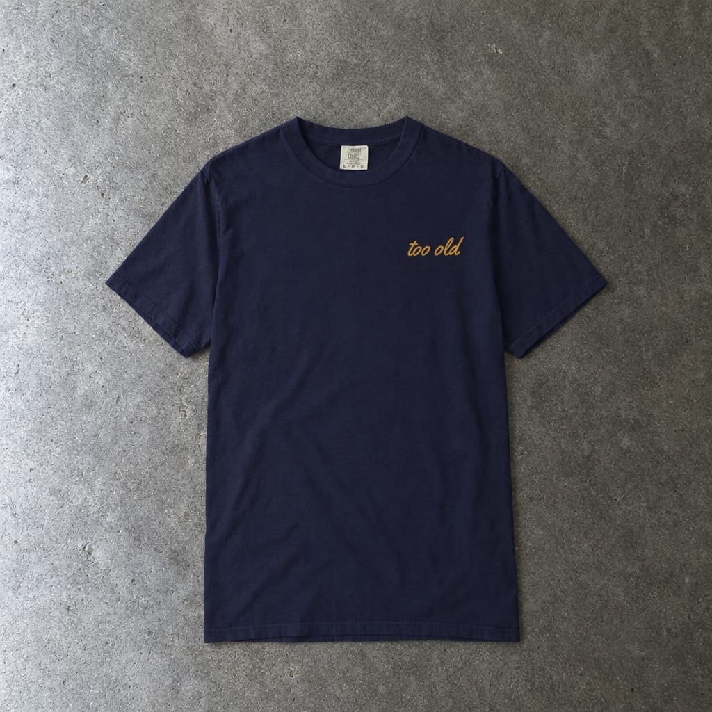 I'm Too Old For This Pit Danny Tee on Comfort Colors in true navy, laid flat