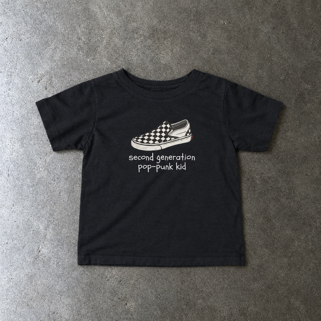 Second Generation Pop-punk Kid 2.0 Baby Tee toddler tee in black, laid flat