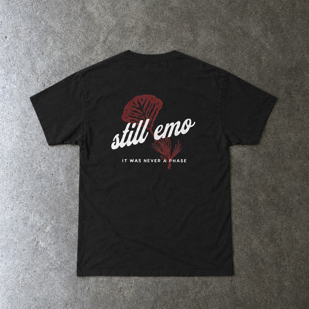 Still Emo Flower Tee toddler tee in black, laid flat, back view