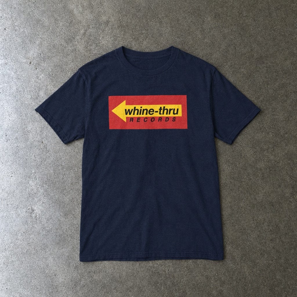 Whine-Thru Records youth tee in navy, laid flat