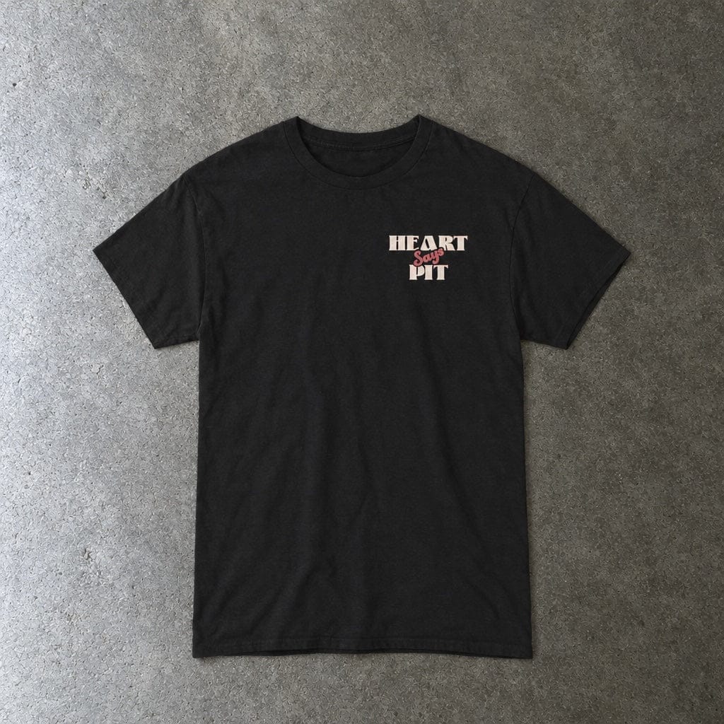 Heart Says Pit, Knees Say Sit Tee in black, laid flat