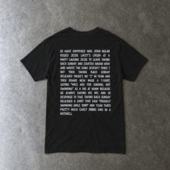 So What Happened Was John.... Tee in black, laid flat, back view