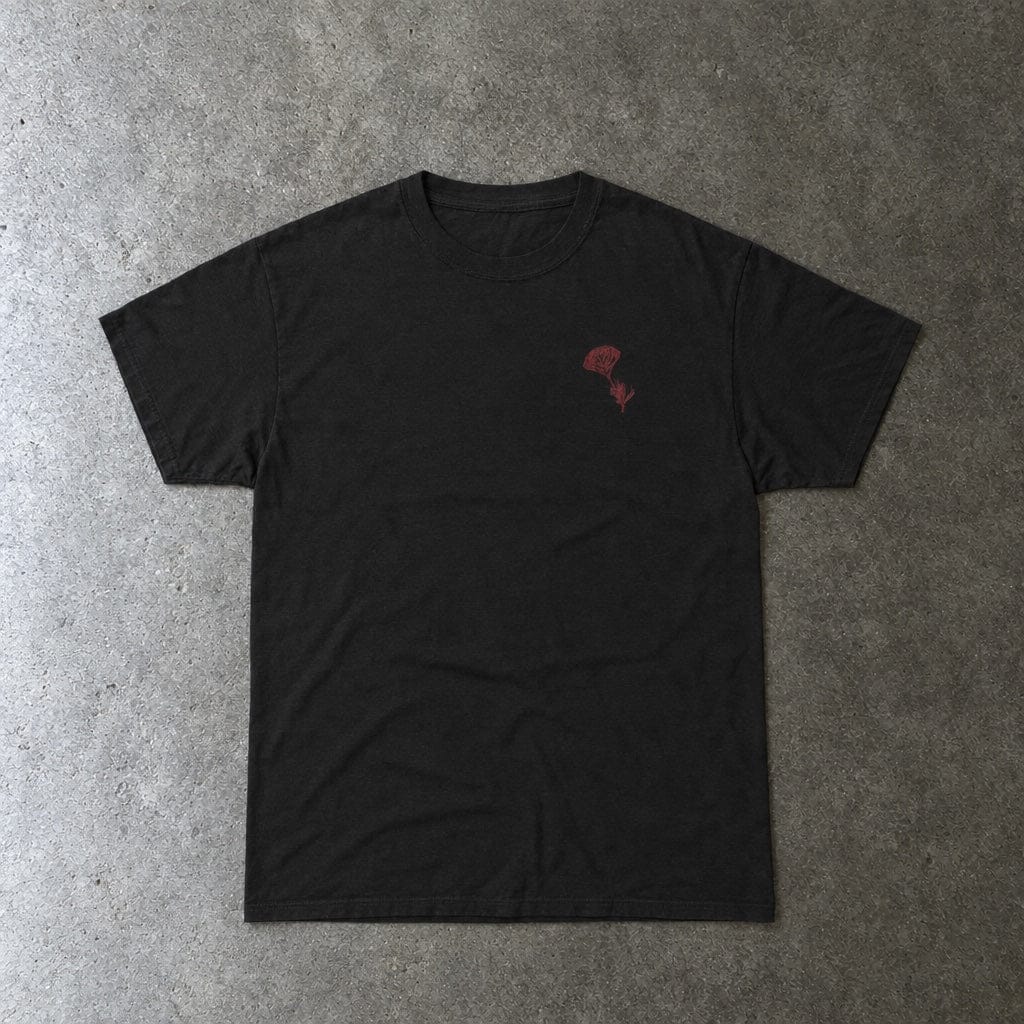 Still Emo Flower Tee in black, laid flat